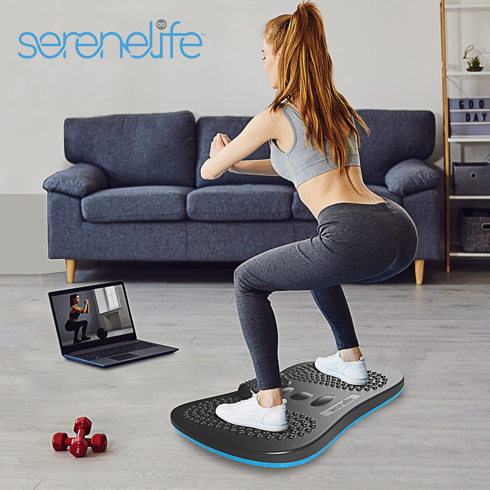 SereneLife beside shoes to show compact size and easy under-desk storage