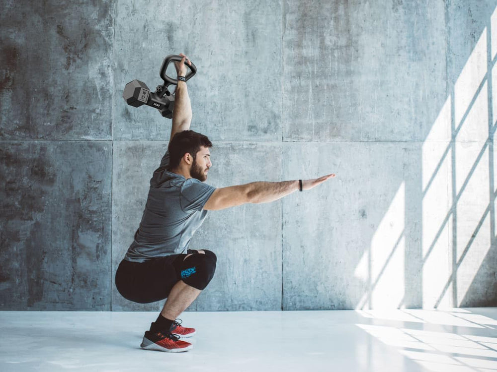 SEWD converter in home gym setting showing space-saving kettlebell solution benefit