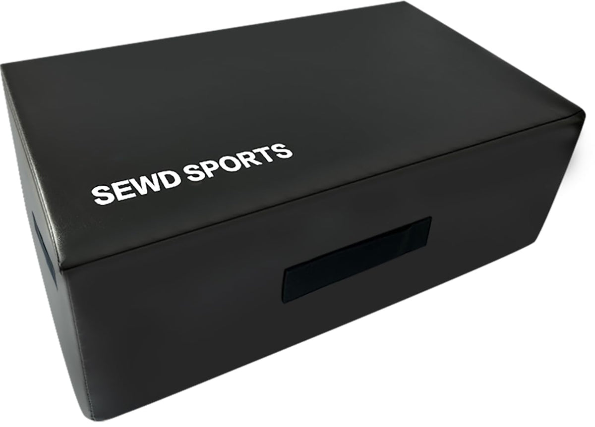SEWD front view of reformer sitting box showing stability and padded comfort