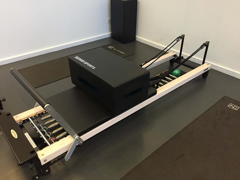 SEWD sitting box beside hand to show compact size and portable benefit