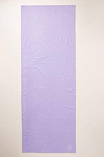 Shandali towel in use during hot yoga class demonstrating non-slip stability benefit