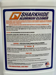 Sharkhide aluminum cleaner spray in use on boat aluminum demonstrating fast stain removal