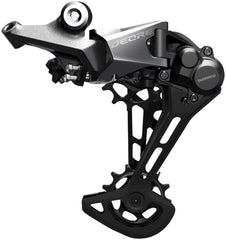 SHIMANO RD-M6100 close-up of 13T pulley revealing smooth chain flow and lower friction
