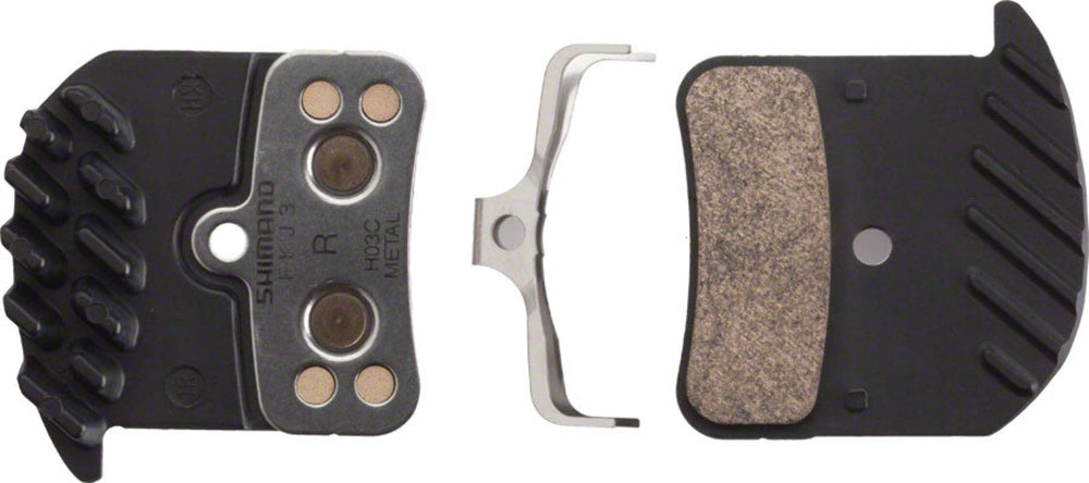 SHIMANO H03C brake pads front view showing spring and split pin, clear fit and reliability