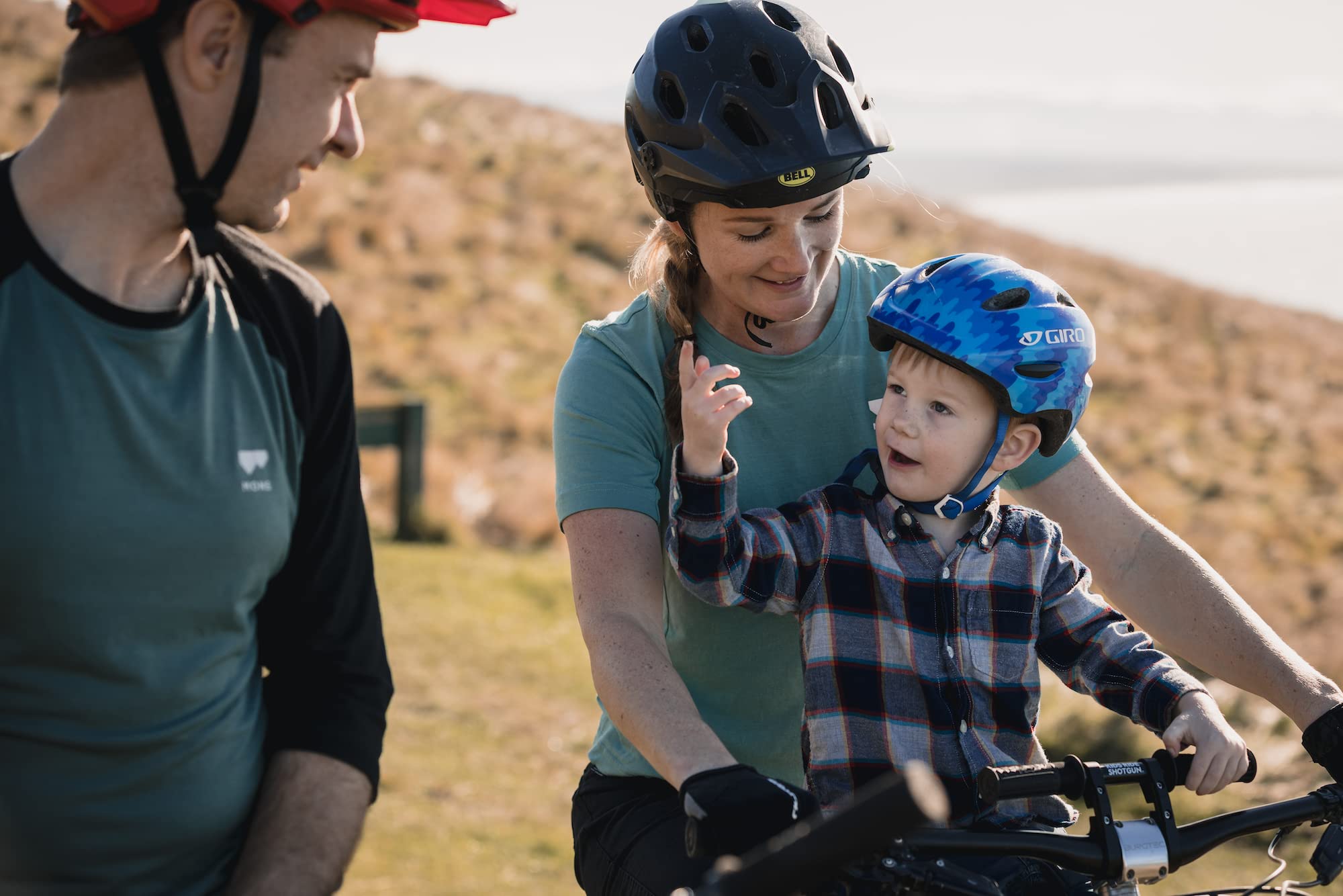 SHOTGUN lifestyle trail shot with child holding bars showing comfort and focus benefit
