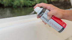 Shurhold Serious Shine spray action on car surface demonstrating easy application