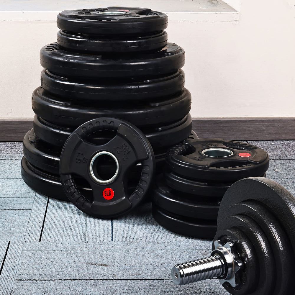 Signature Fitness clear LB and KG markings making weight selection fast and error-free