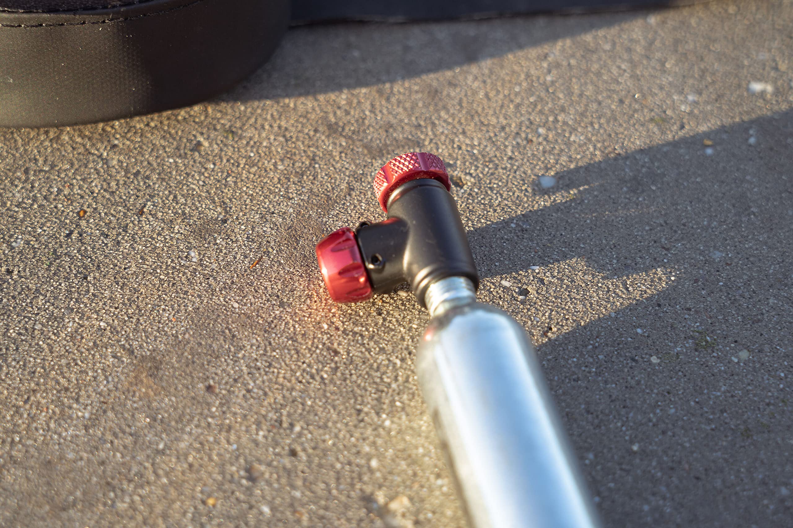 SILCA EOLO IV connected to Schrader valve illustrating universal compatibility benefit