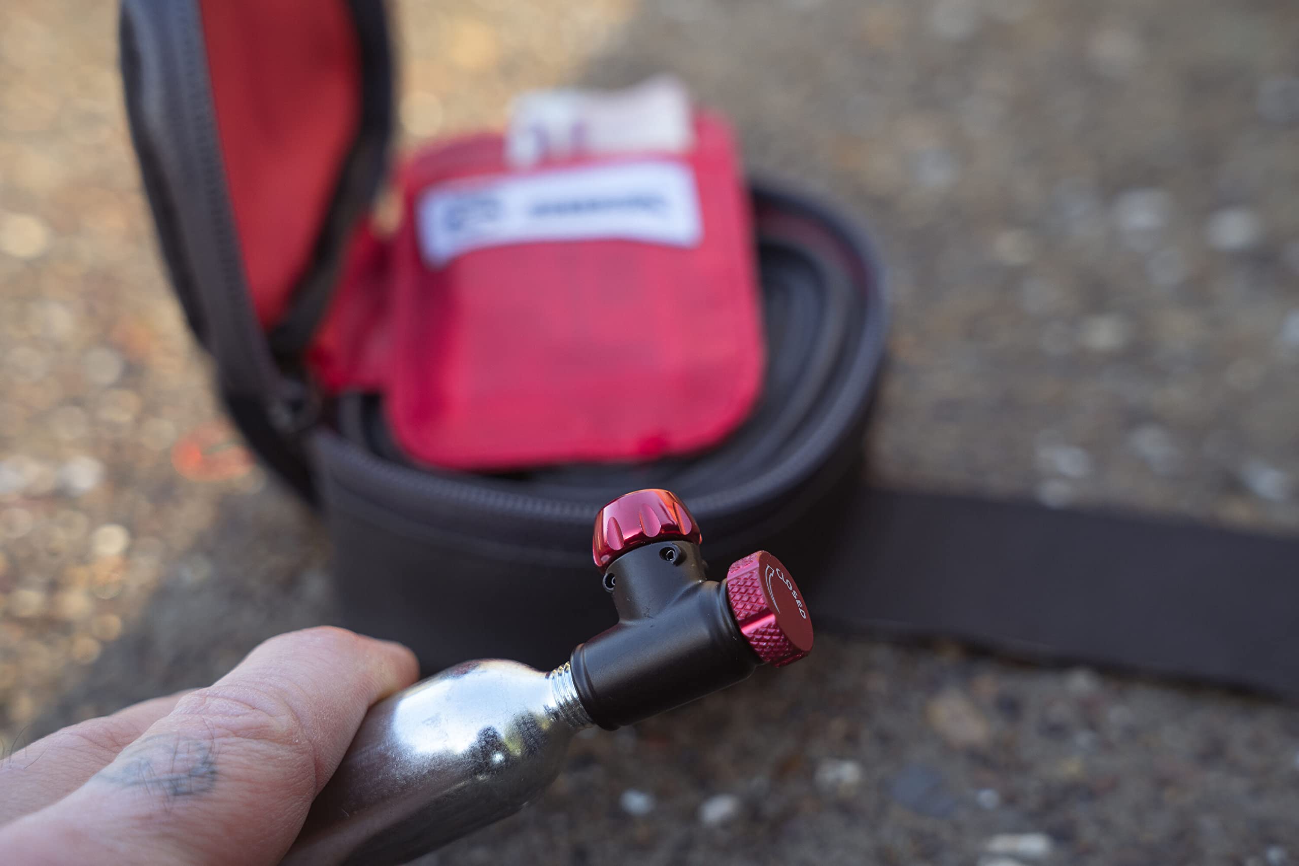 SILCA EOLO IV next to 16g cartridge showing scale and travel-ready compactness