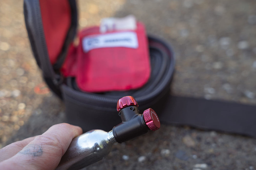 SILCA EOLO IV next to 16g cartridge showing scale and travel-ready compactness