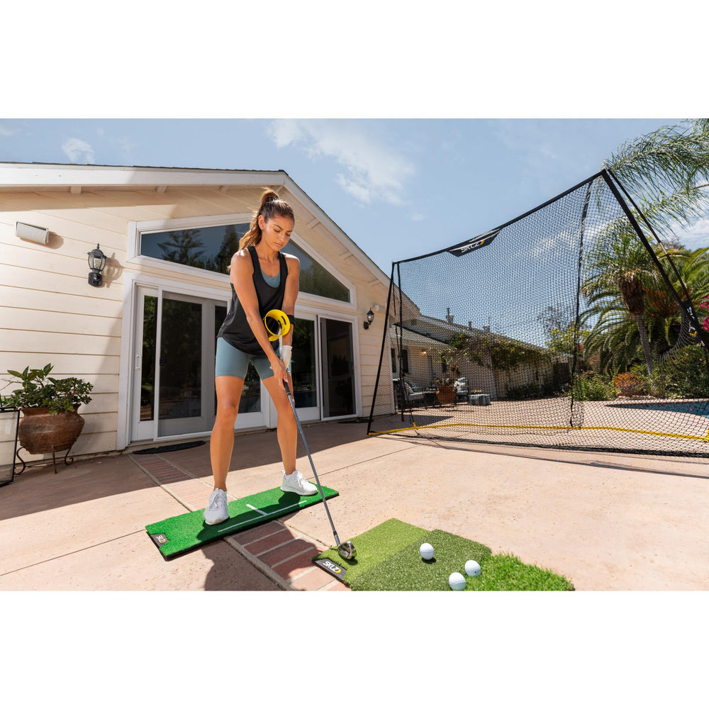 SKLZ lifestyle image on driving range aiding realistic practice benefit