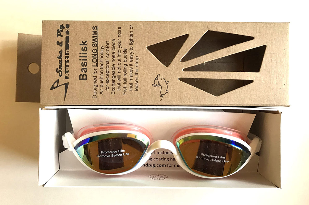 Child wearing Snake & Pig Basilisk goggles learning to swim with secure seal