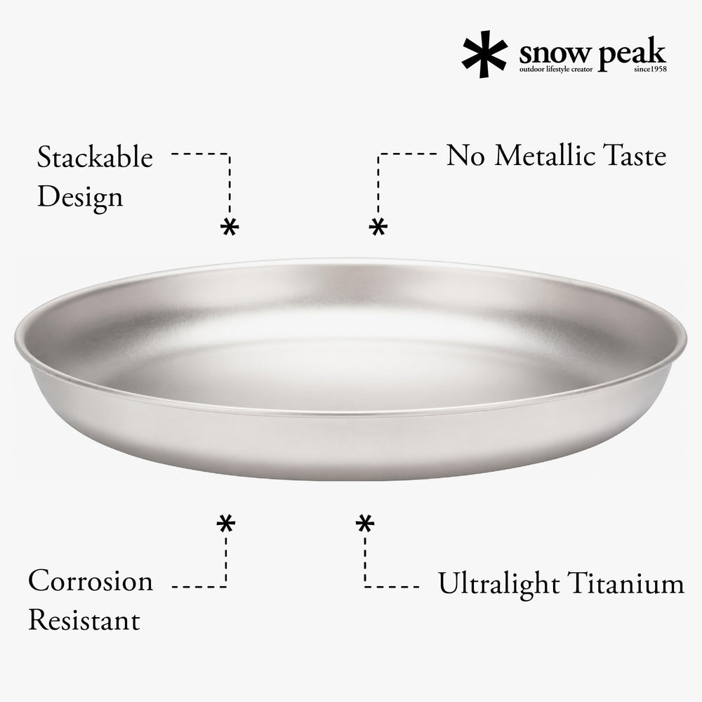 Snow Peak plate held in hand demonstrating compact scale and portability