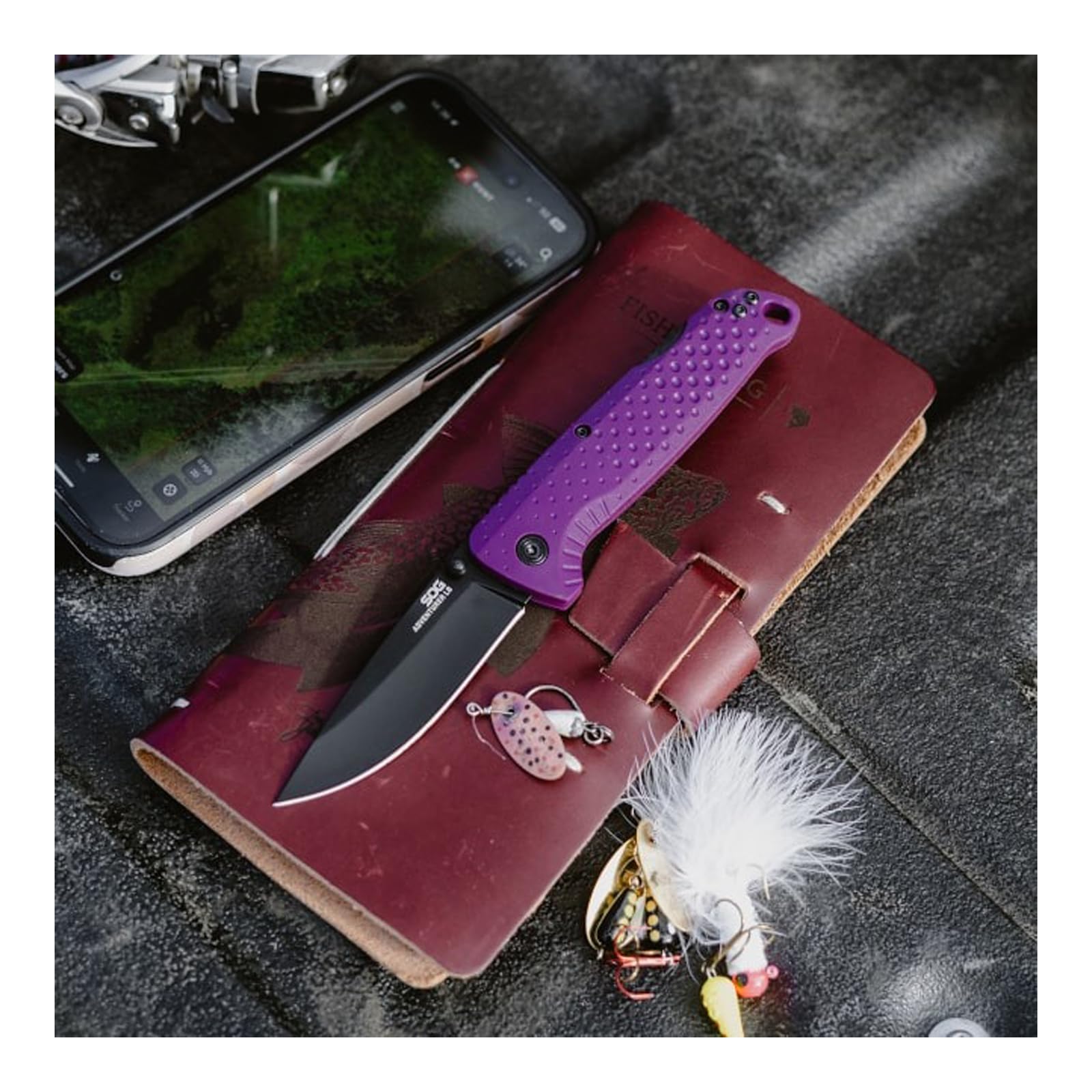 SOG Adventurer on camping gear showing outdoor use and reliable performance