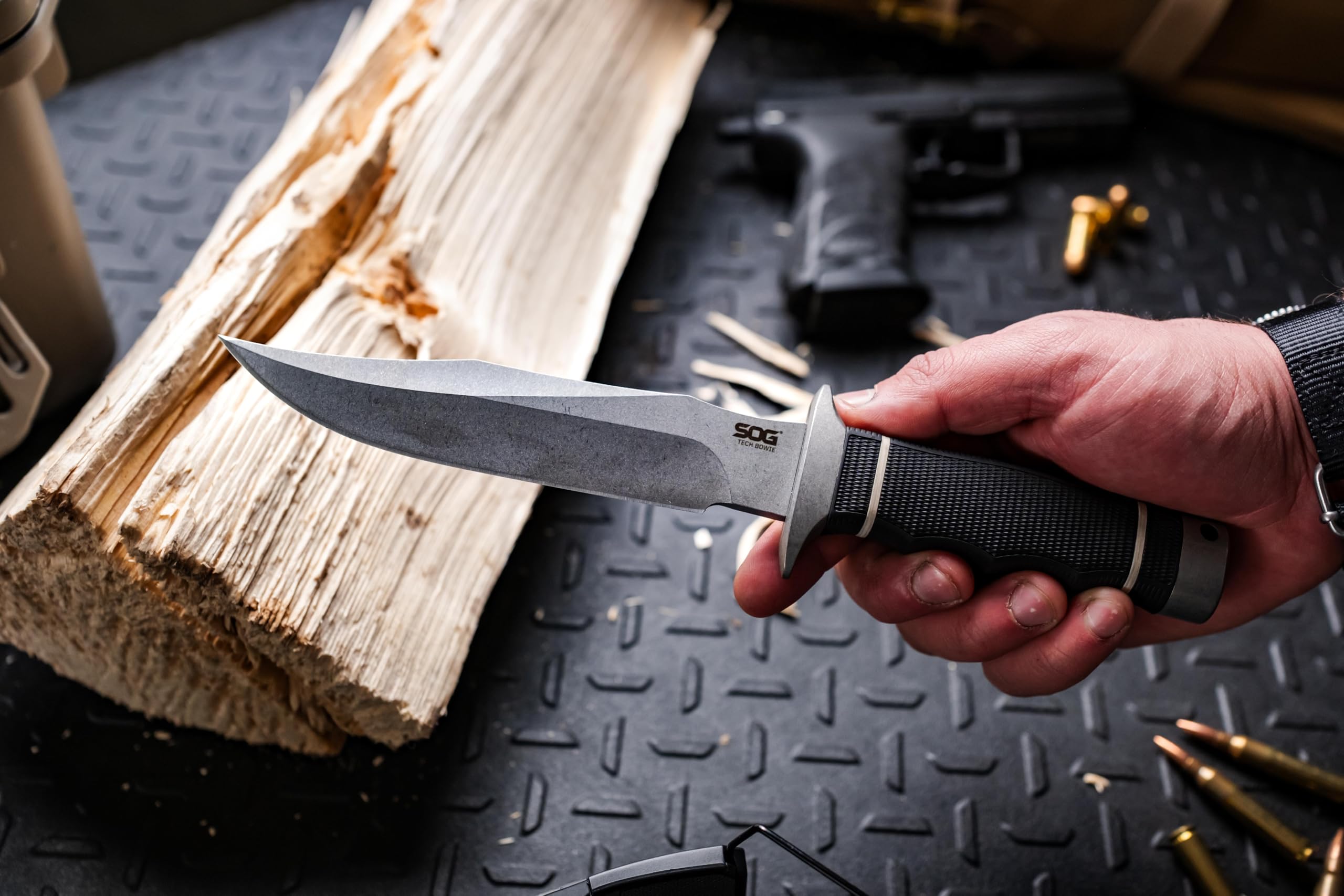 SOG Tech Bowie with sheath in pack showing carry readiness and transport benefit