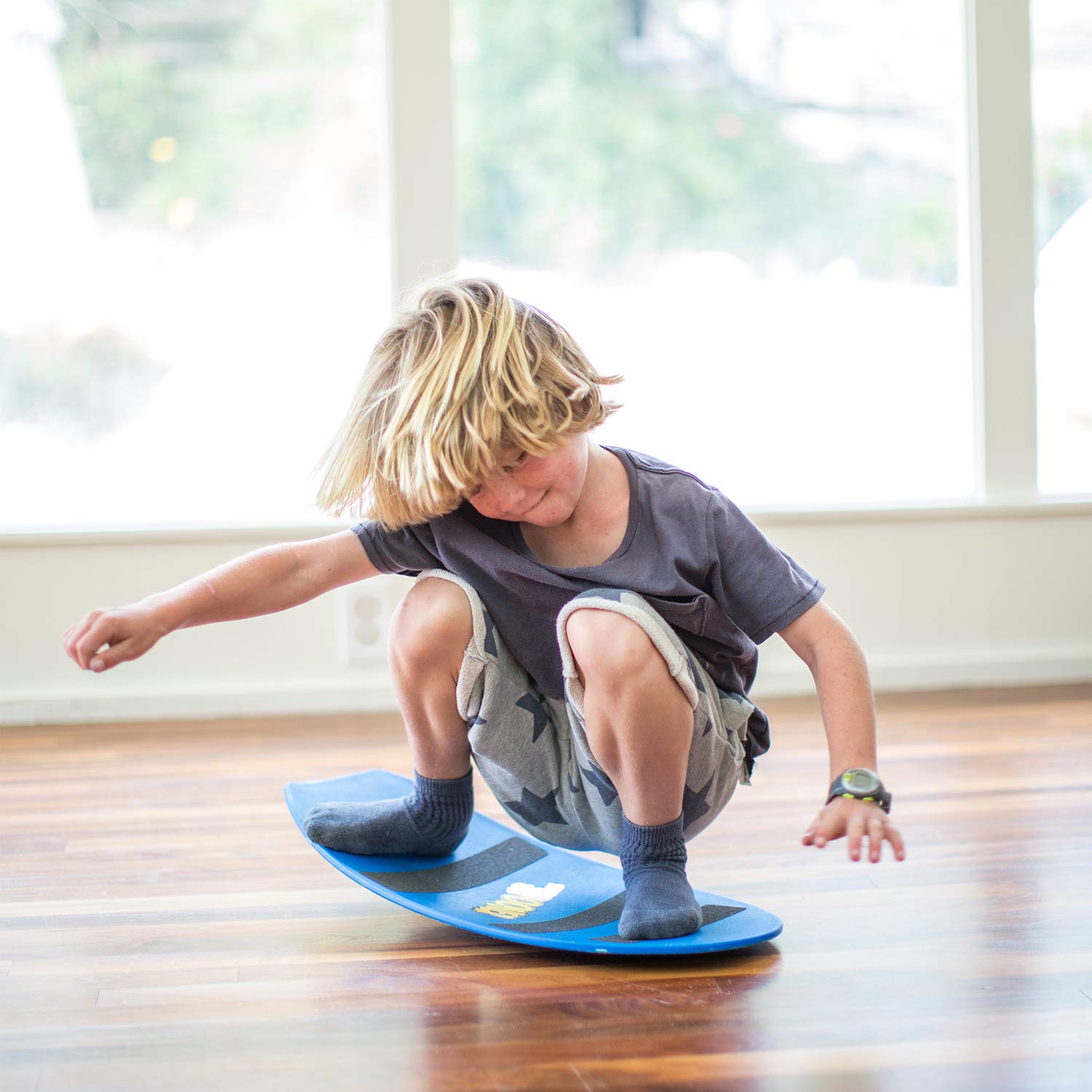 Spooner Boards Freestyle blue in use with child practicing balance and coordination