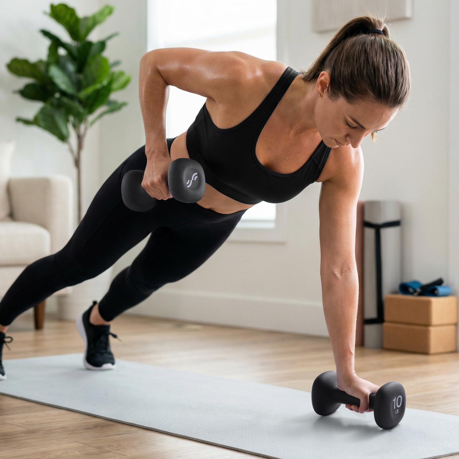 Sportneer dumbbells used during Pilates in a living room for versatile home workouts