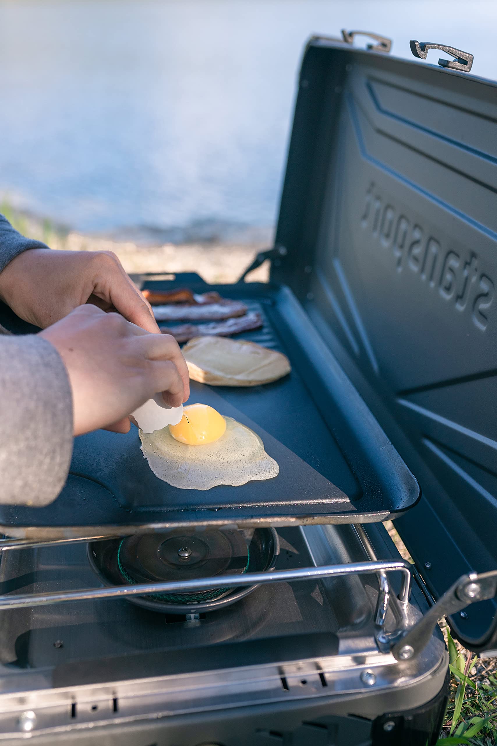 Stansport griddle cooking pancakes showing consistent browning benefit