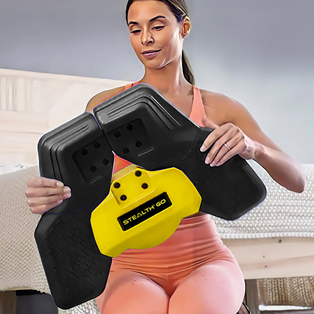 Stealth Fitness StealthGO next to water bottle showing compact size and easy storage benefit