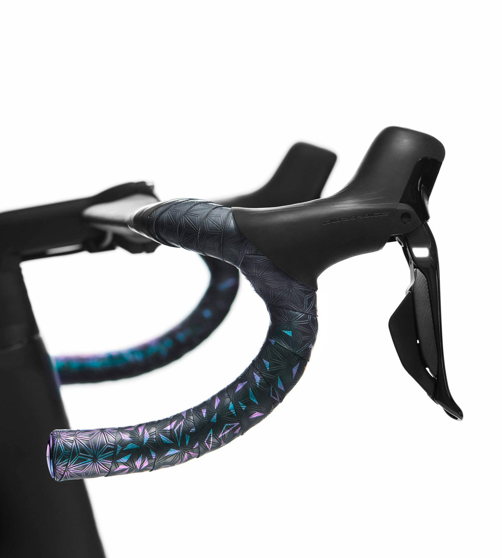 Supacaz Oil Slick Star Plugz mounted, anodized finish adds durable cockpit accent