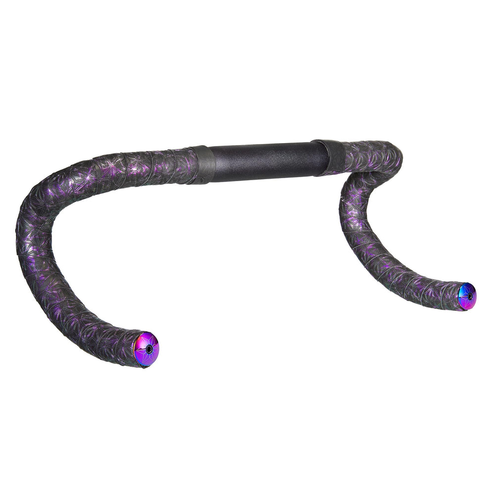 Oil Slick Star Plugz inserted in bar end highlighting Supacaz polished finish and protective fit
