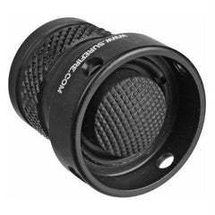 Close-up of SureFire button guard and switch detail reducing accidental activation