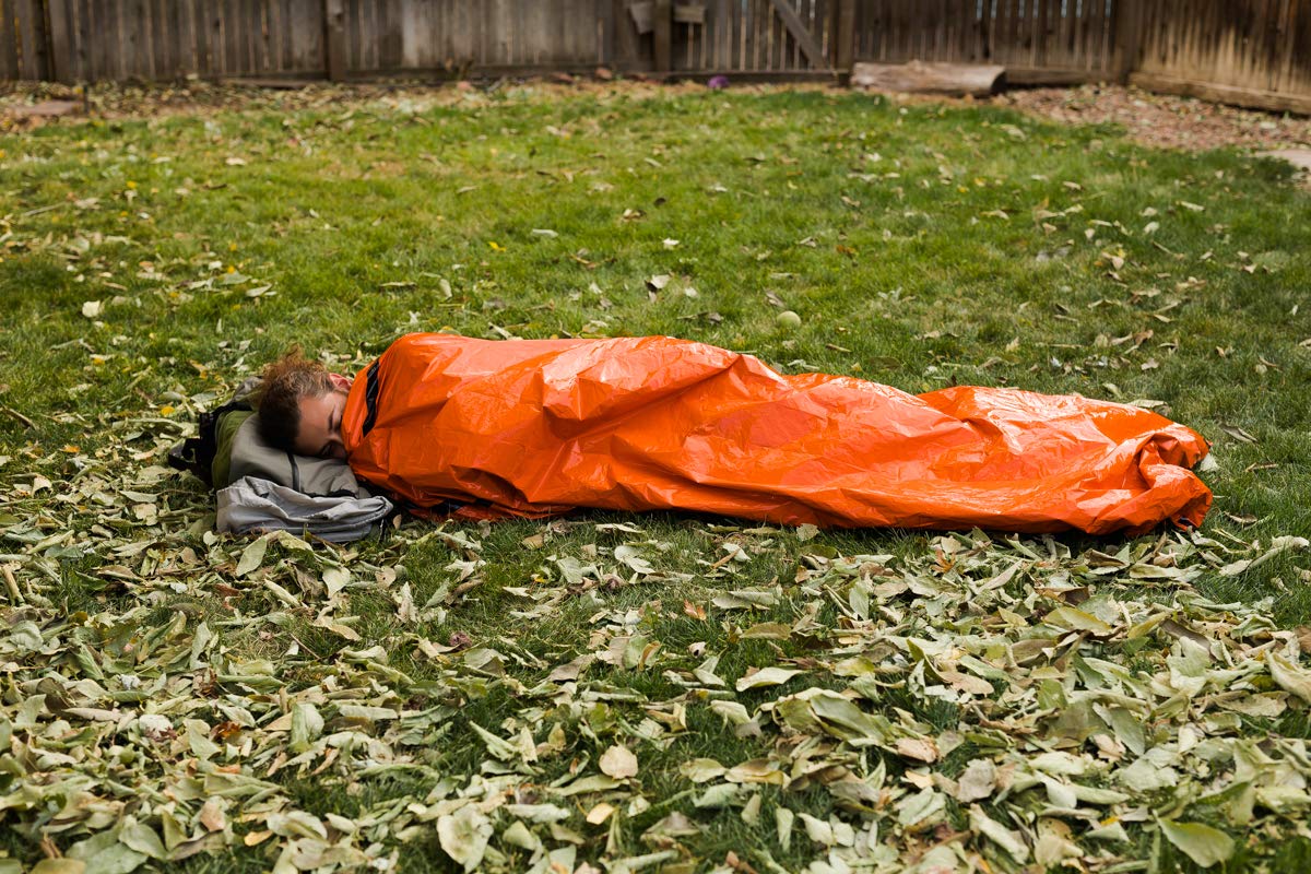 Survival Frog bivvy compressed in stuff sack demonstrating compact carry and space-saving benefit