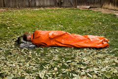 Survival Frog bivvy compressed in stuff sack demonstrating compact carry and space-saving benefit