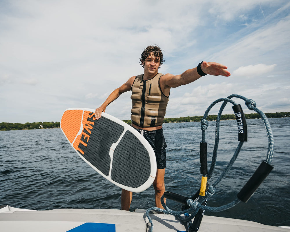SWELL Wakesurf rope in use behind boat showing easy-release and visibility benefit
