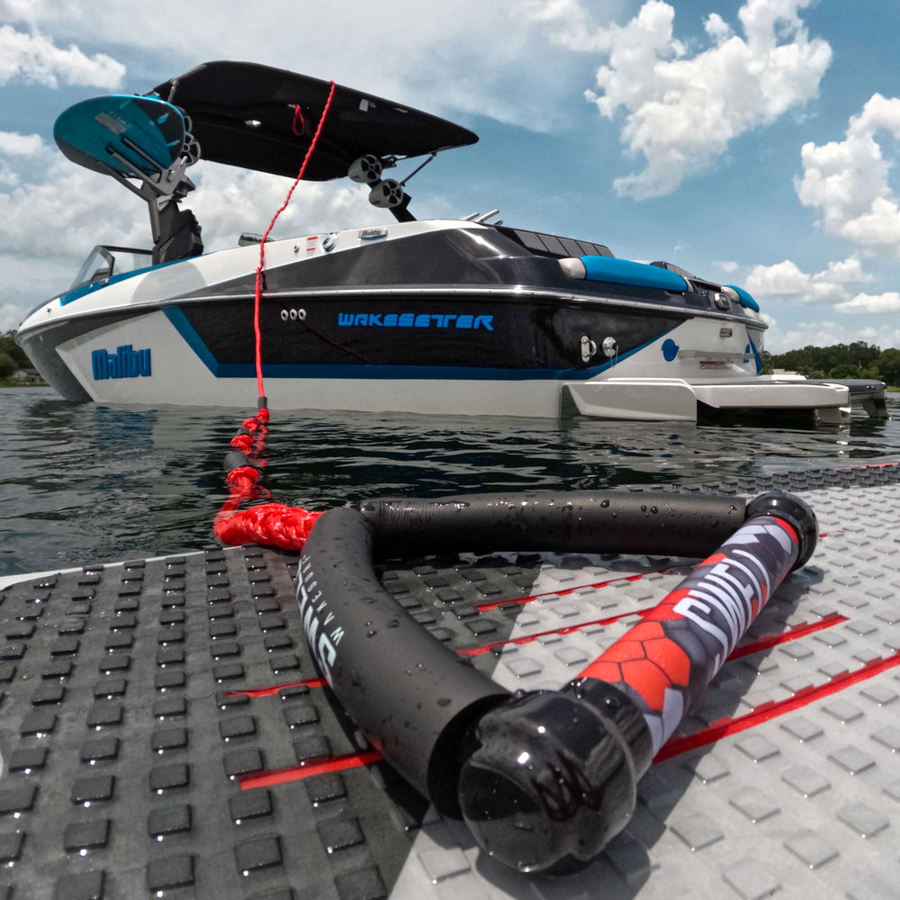 SWELL Wakesurf coiled 24-foot rope on deck highlighting compact storage benefit