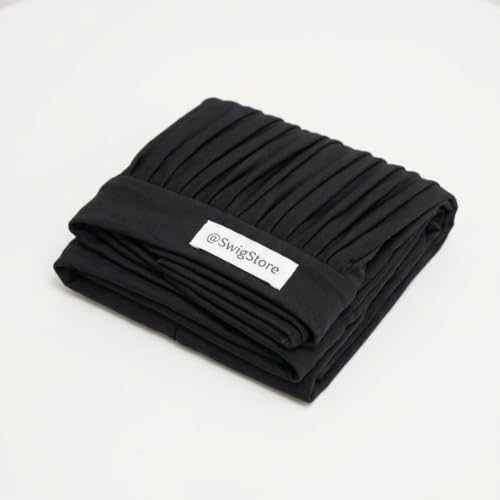 SWIG turban held in hand to show size and one-size-fits-most scale
