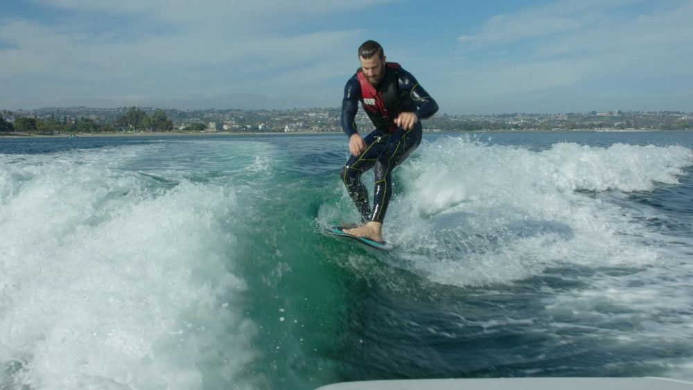 Sylvan Wave Maker in use behind boat showing cleaner, surfable wake benefit