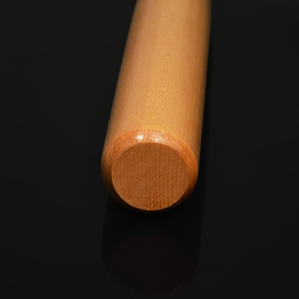SZYT bat stored by entryway showing easy access and visible color