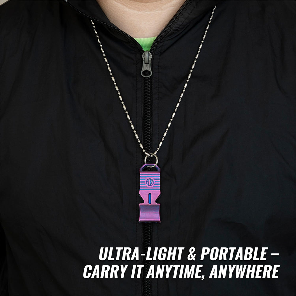 TACRAY whistle clipped to backpack showcasing outdoor portability