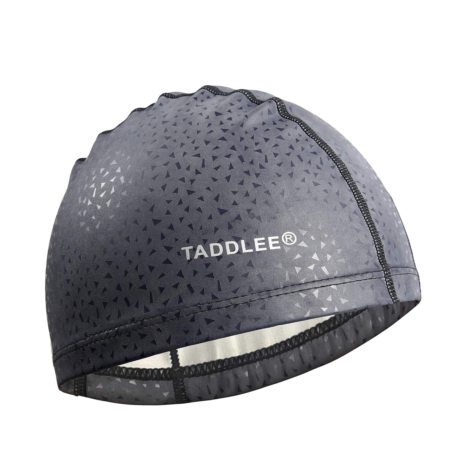 Taddlee cap worn by swimmer demonstrating secure fit and low drag