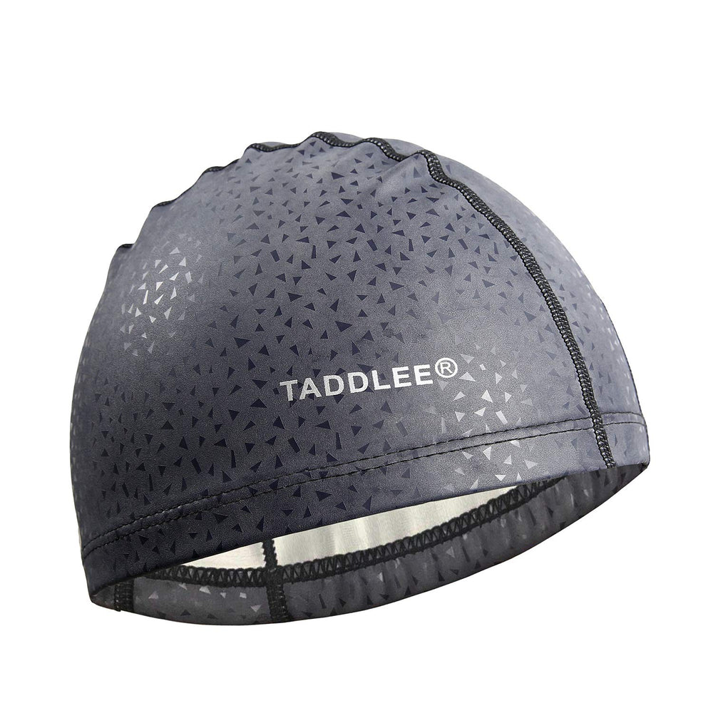 Taddlee cap worn by swimmer demonstrating secure fit and low drag