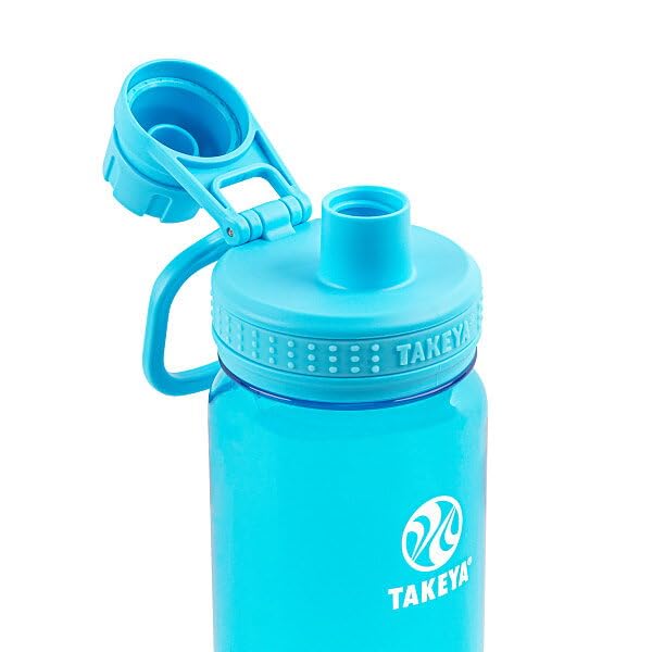 Takeya Tritan bottle in gym setting beside weights demonstrating durability and convenient one-handed use