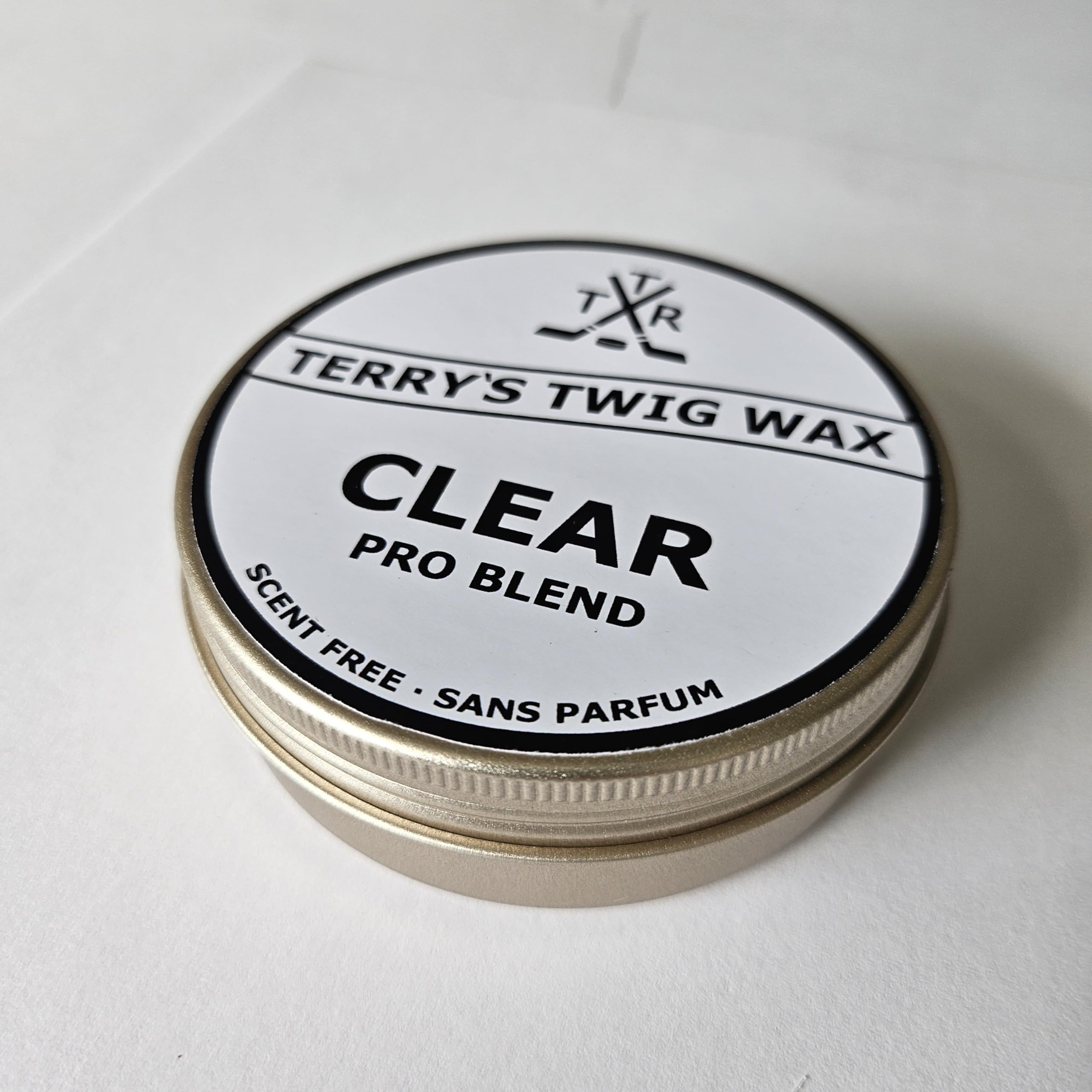 Terry's Twig Wax tin next to a ruler showing 80g size and long-lasting supply