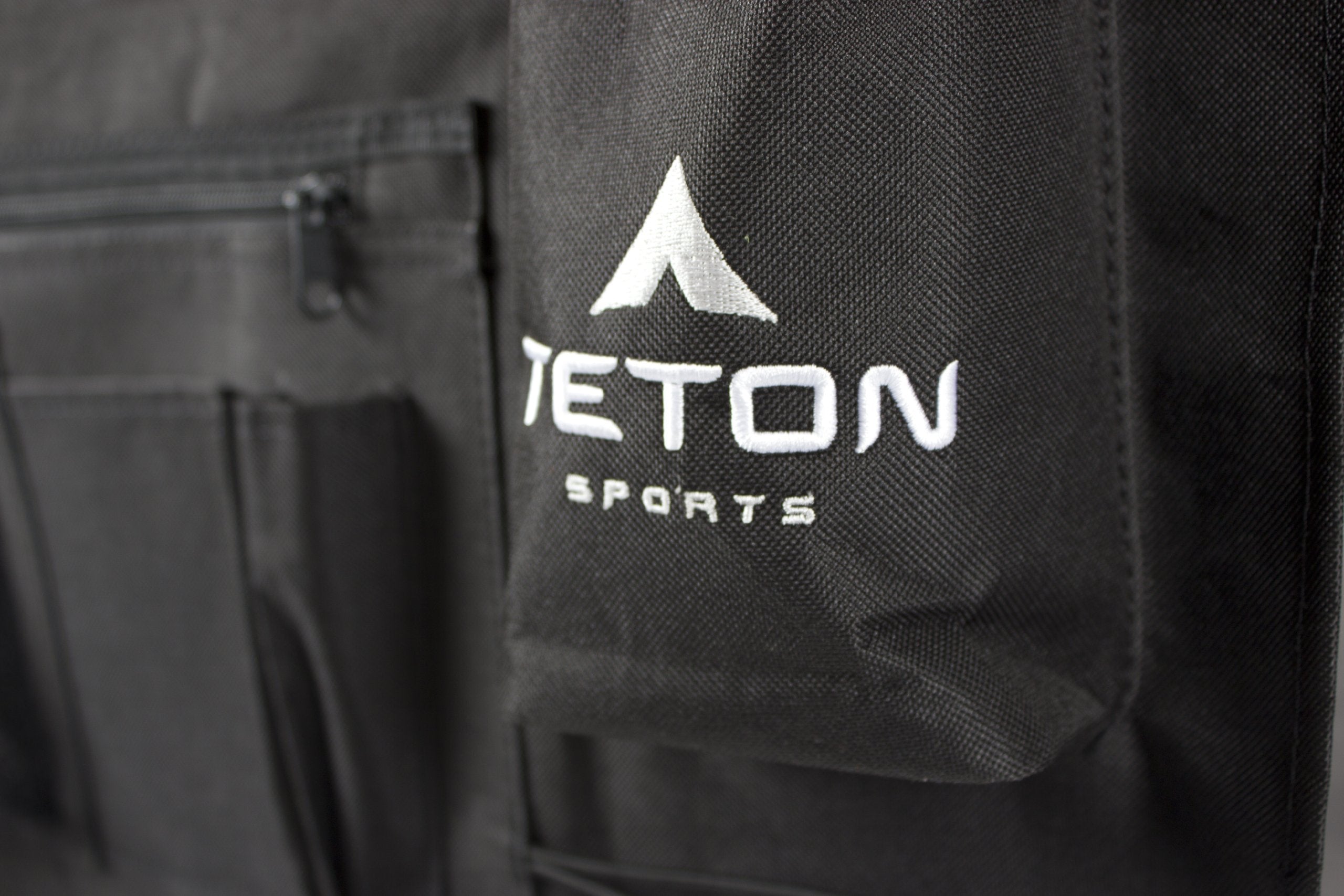 TETON Sports under-cot hammock loaded with boots and pack to keep gear off the ground