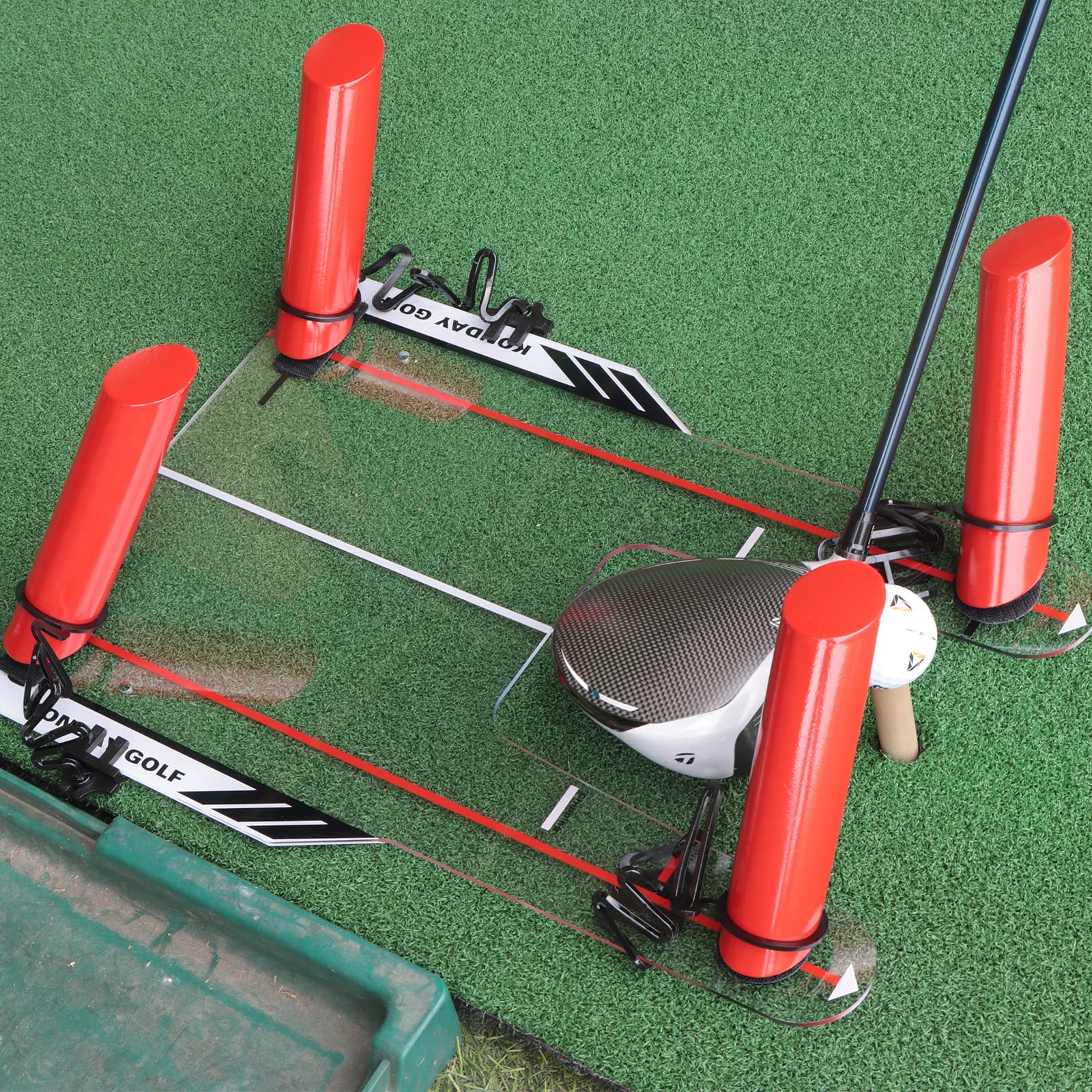 THE GOLFER STORE golfer using the aid with an iron to improve ball contact and trajectory