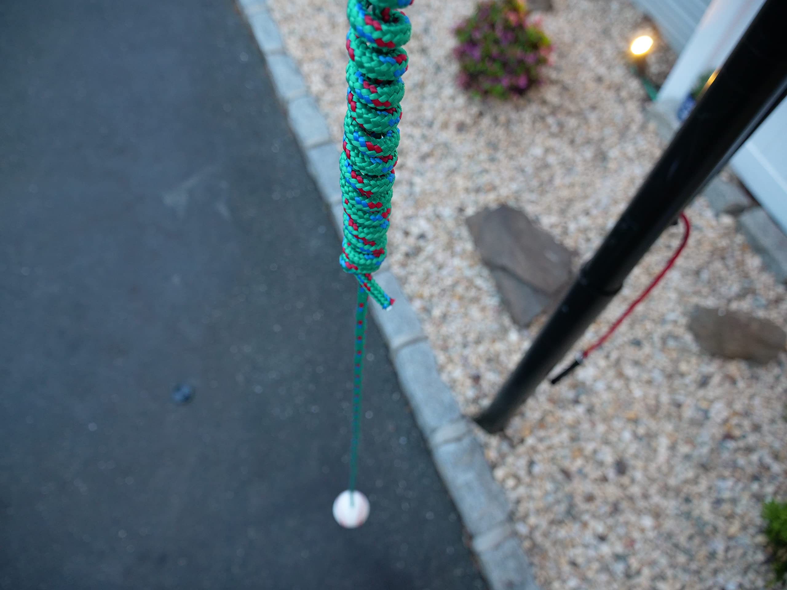 The Hitting Rope in a backyard setting showing accessible practice anywhere