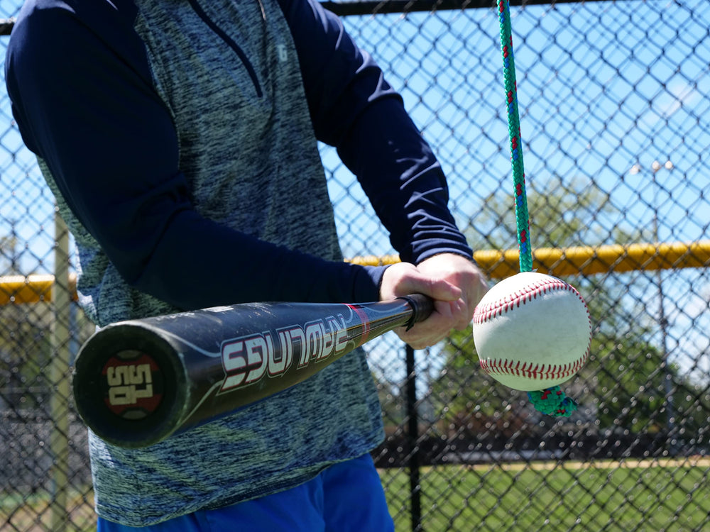The Hitting Rope in use by a youth player improving timing and swing mechanics