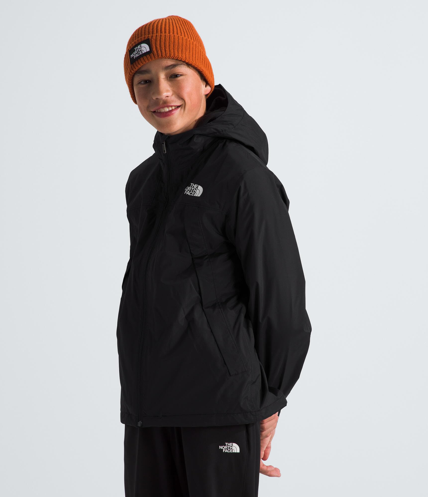 The North Face back view highlighting hood and coverage benefit