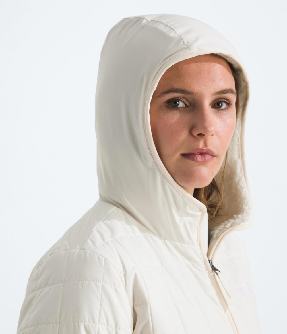 The North Face parka fabric close-up showing recycled insulation benefit