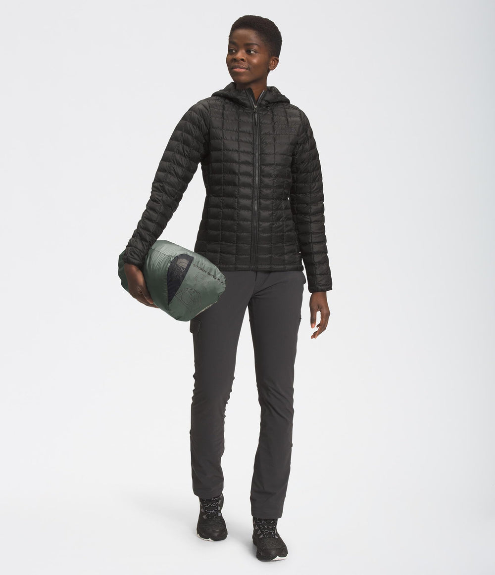 The North Face Stormbreak 3 pitched lakeside illustrating quick setup and campsite comfort benefit