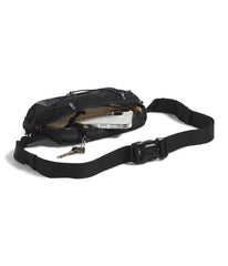 The North Face Terra Lumbar zippered pocket detail showing organized storage and key clip