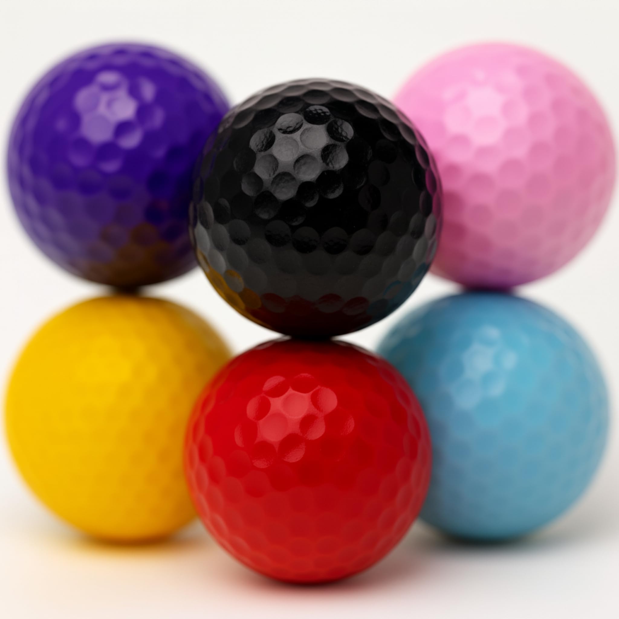 Thorza ball next to a standard golf ball showing true-to-size benefit