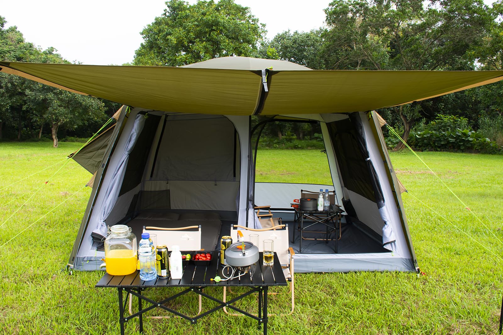 Three Bears tent fully staked at campsite demonstrating wind-resistant anchoring