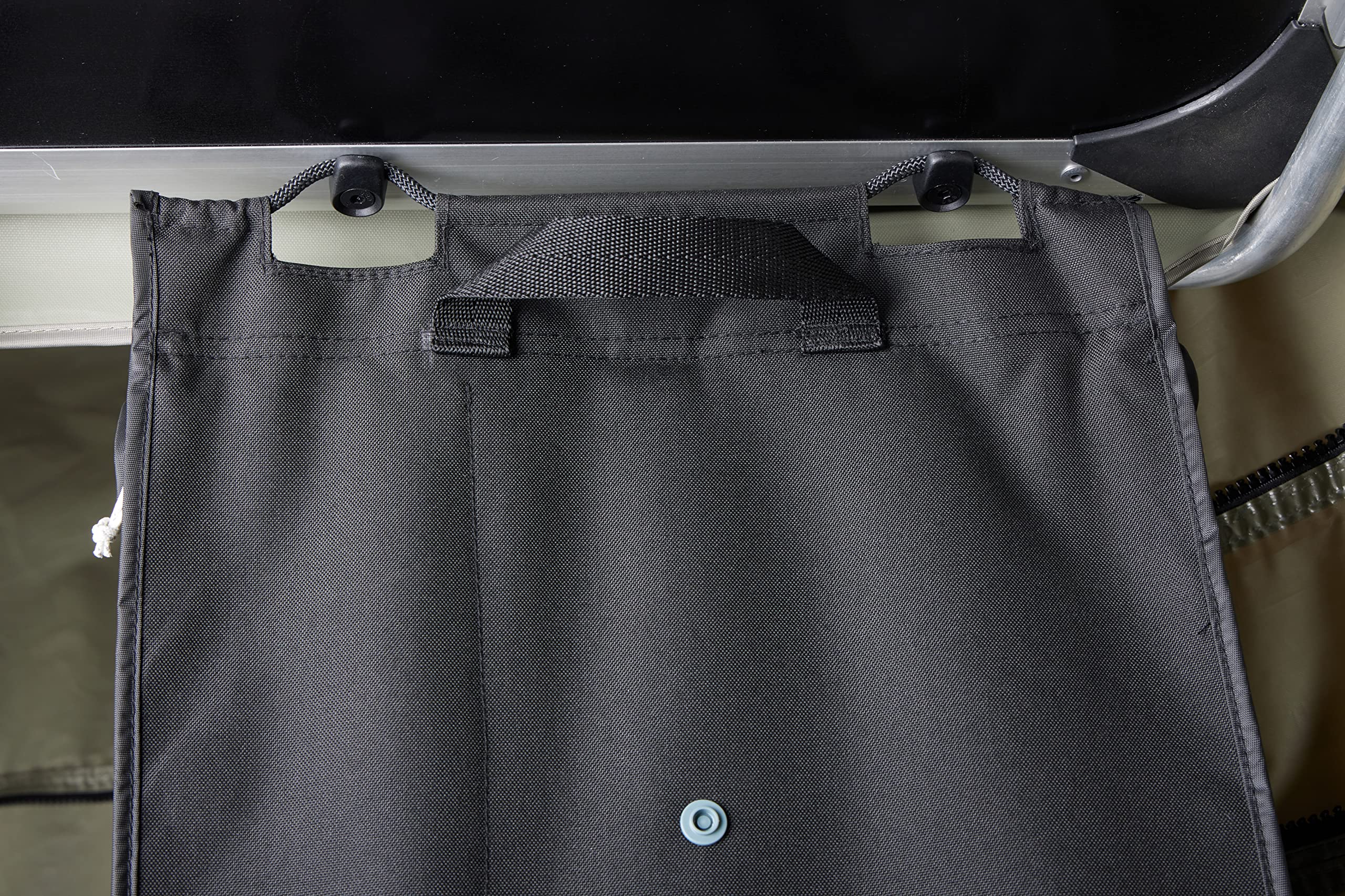 Thule organizer in campsite lifestyle shot reducing tent clutter