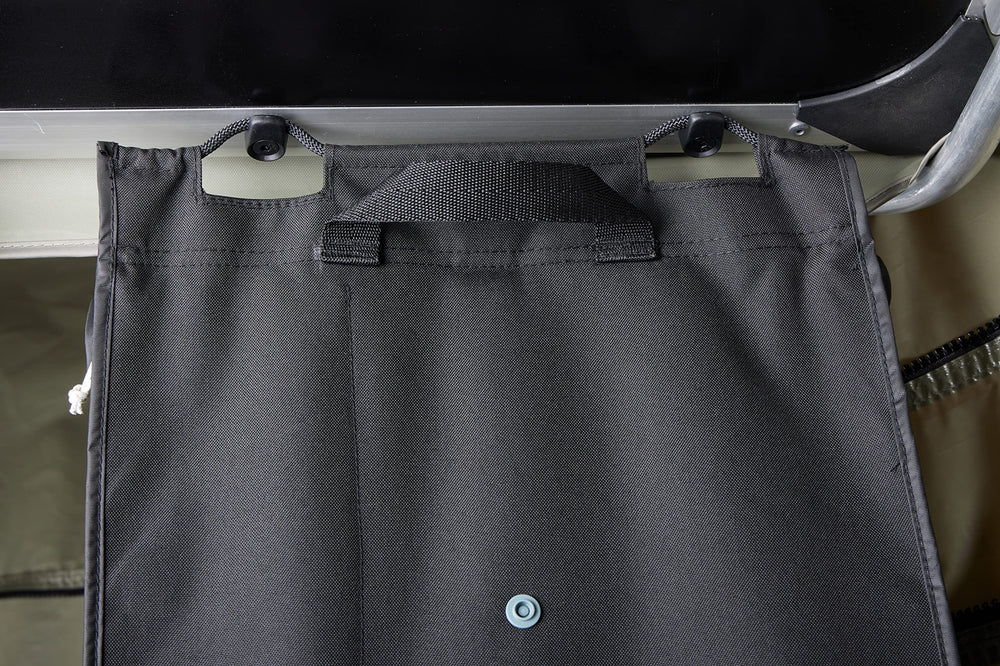 Thule organizer in campsite lifestyle shot reducing tent clutter